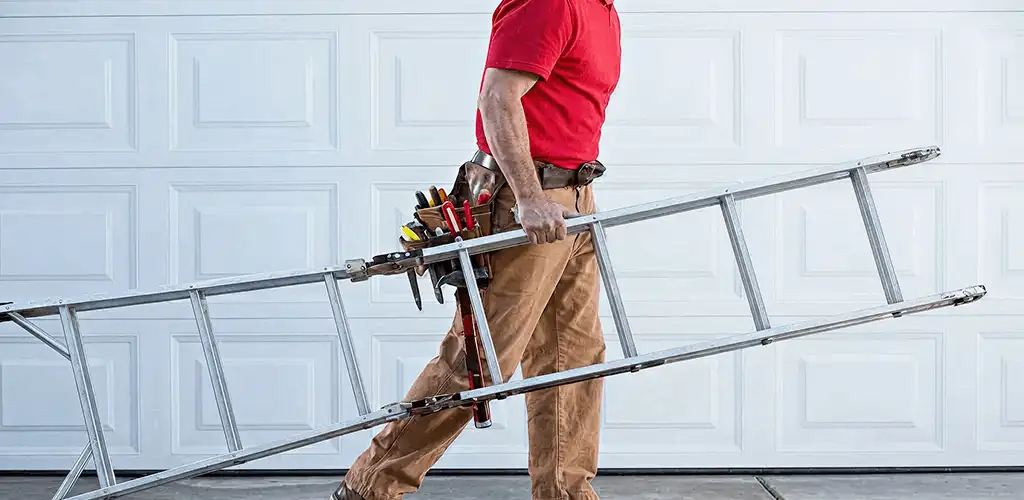 Garage door repair technician arriving with tools and ladder in Eugene, OR