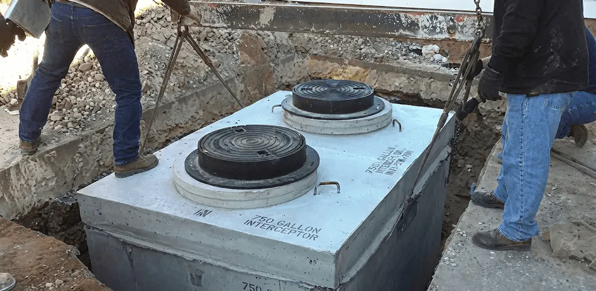 Grease trap installation for a commercial property drainage system in Eugene, OR