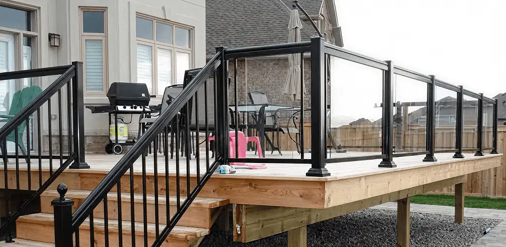 Handrail installation on a deck staircase for safety and code compliance in Eugene, OR